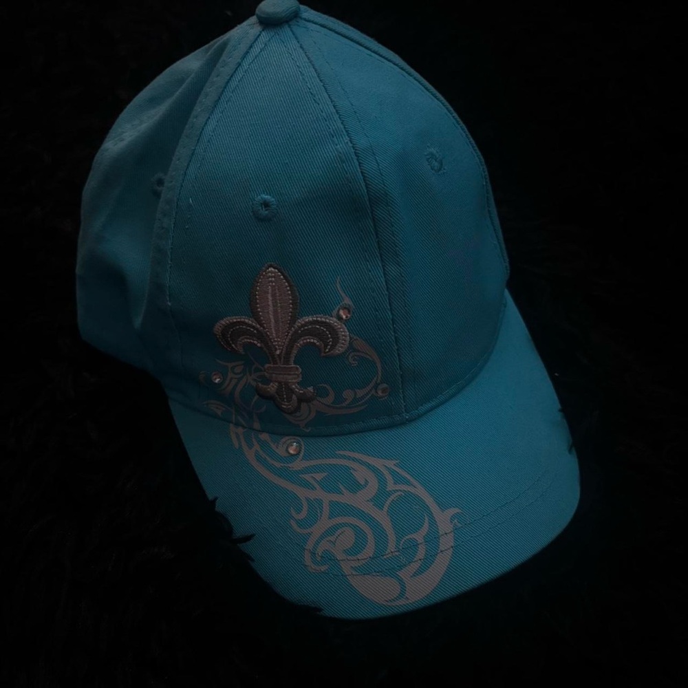 Blue Cap with Fleur-de-Lis Design